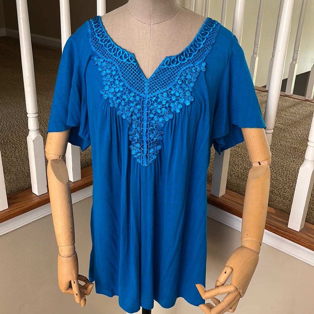 1x blue shirt